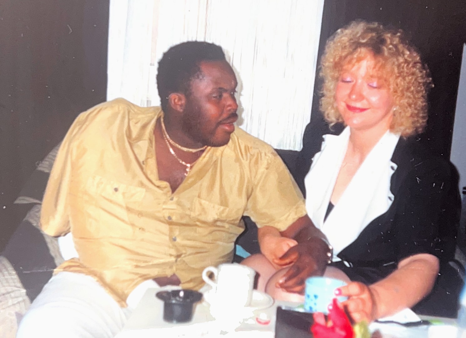 Bobby and Sylvia together on the sofa